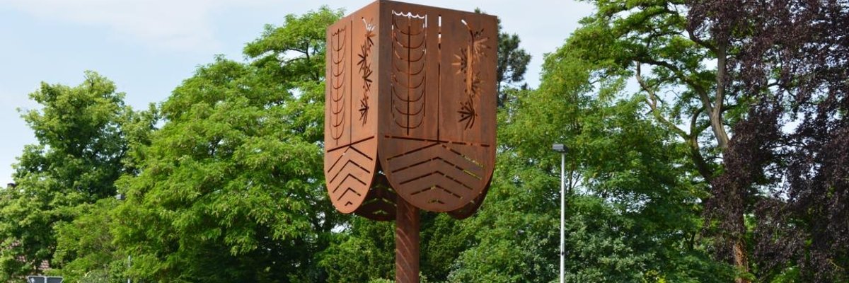 Verkehrsinsel in Steinhagen mit Wappen